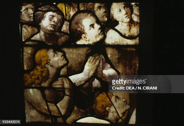 Faithful in prayer, Last Judgment, stained-glass window in the Cathedral of St Michael and St Gudula, 13th-17th century, Brussels, Belgium.