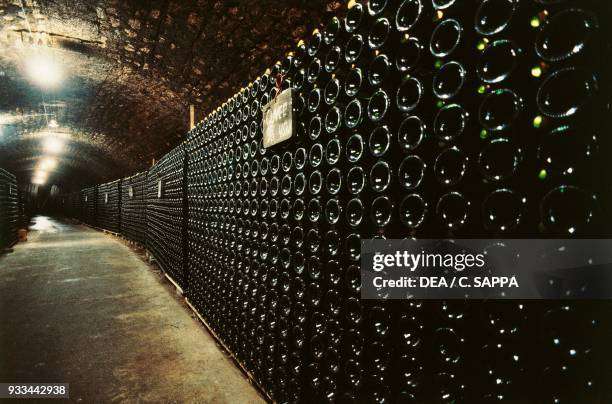Cellar with bottles for aging Champagne, Remich, Grand Duchy of Luxembourg.