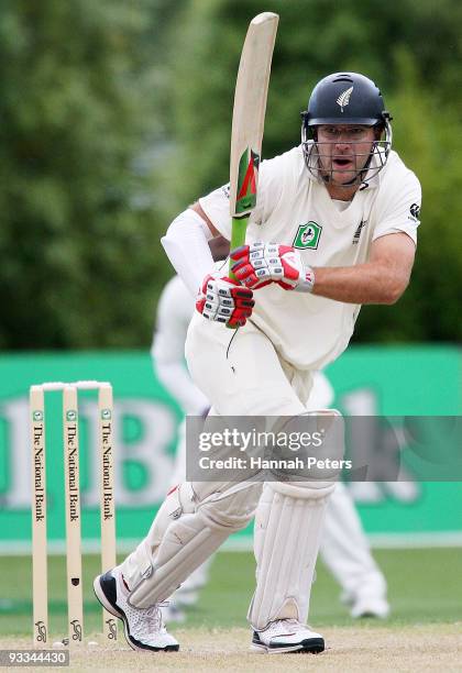 Daniel Vettori of New Zealand drives the ball away for four runs during day one of the First Test match between New Zealand and Pakistan at...