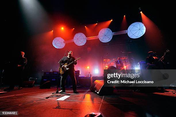 Guitarist Joey Santiago, guitarist and vocalist Frank Black, drummer David Lovering and bassist Kim Deal of the Pixies perform at Hammerstein...