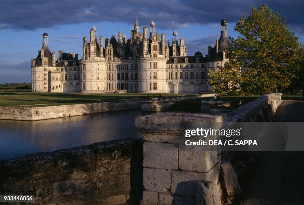 Chateau de Chambord, 1519-1547, the decorative moat in the foreground, at sunset, Loire Valley , Centre, France, 16th century.
