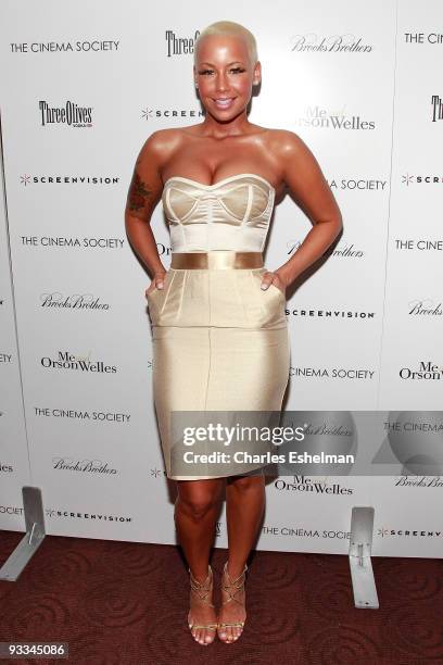 Model Amber Rose attends a screening of "Me And Orson Welles" hosted by the Cinema Society, Screenvision and Brooks Brothers at Clearview Chelsea...