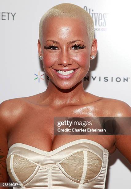 Model Amber Rose attends a screening of "Me And Orson Welles" hosted by the Cinema Society, Screenvision and Brooks Brothers at Clearview Chelsea...