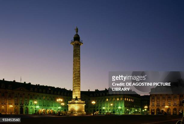 The Austerlitz Column in Place Vendome at night, Paris, Ile-de-France, France.