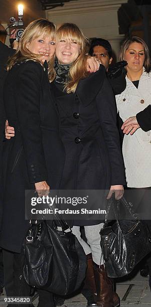 Twiggy and Carly Lawson attend the switch on ceremony for the Stella McCartney store christmas lights on November 23, 2009 in London, England.