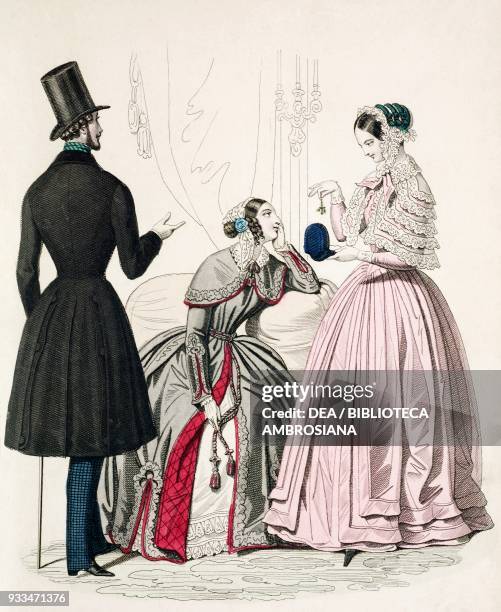 Male sketch in morning suit with stick and female sketches in beige dress and in pink dress with cloak and hat, plate 66 taken from Parisian Fashion,...