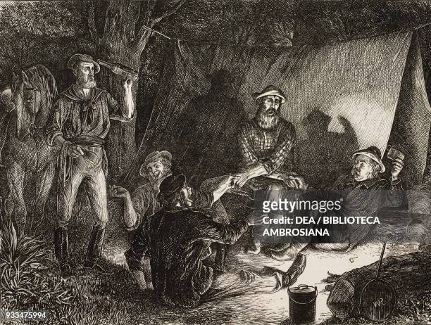 Camp of gold diggers at Christmas eve, song around the campfire , Australia, drawing by W Ralston, illustration from the magazine The Illustrated...