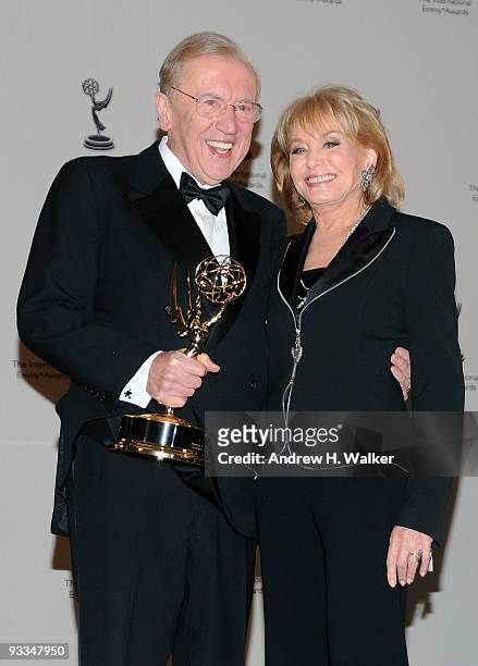 Sir David Frost and Barbara Walters attend the 37th International Emmy Awards gala press room at the New York Hilton and Towers on November 23, 2009...