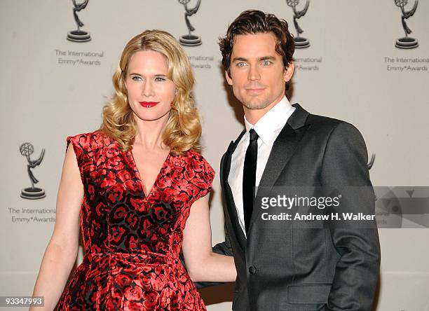 Actors Stephanie March and Matthew Bomer attend the 37th International Emmy Awards gala press room at the New York Hilton and Towers on November 23,...