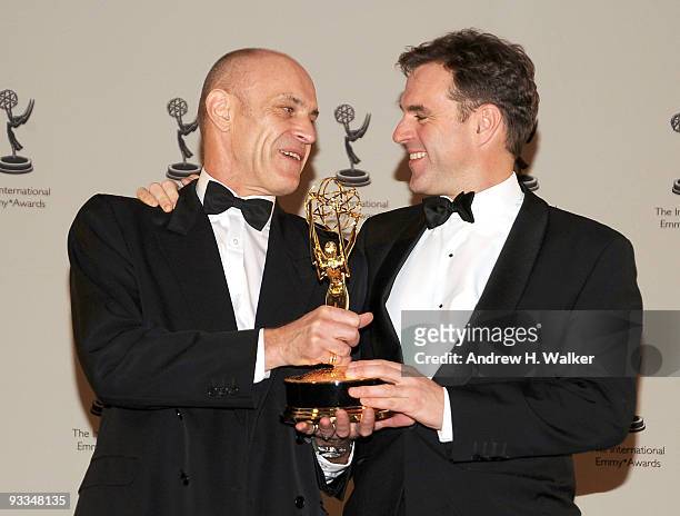 Adrian Pennink and Prof. Niall Ferguson attend the 37th International Emmy Awards gala press room at the New York Hilton and Towers on November 23,...