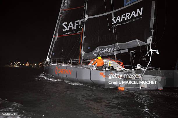 French skippers Marc Guillemot and Charles Caudrelier , aboard the monohull "Safran", arrive in Puerto Limon harbour on November 24, 2009 after...