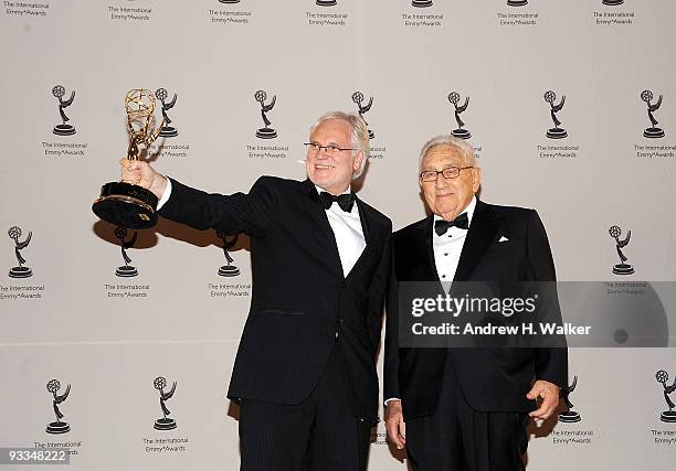 Prof. Markus Schachter and Dr. Henry Kissinger attend the 37th International Emmy Awards gala press room at the New York Hilton and Towers on...
