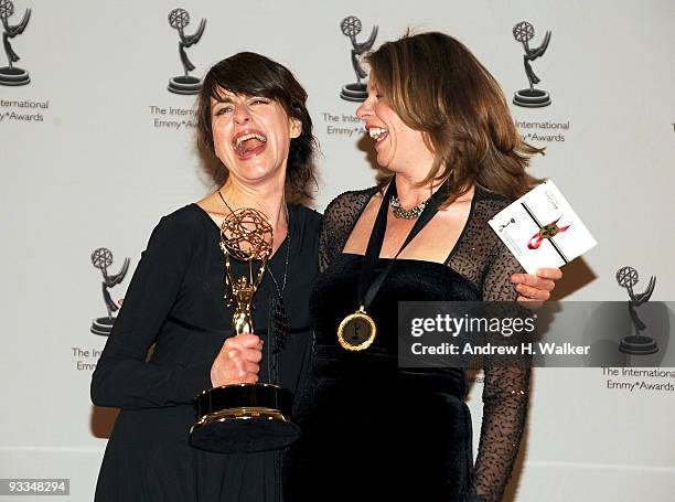 Juliet May and Julia Outson attend the 37th International Emmy Awards gala press room at the New York Hilton and Towers on November 23, 2009 in New...