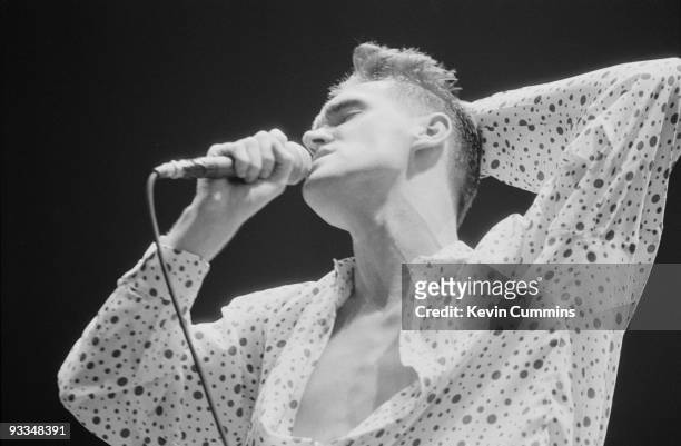 Singer Morrissey of the English pop group The Smiths at the GMEX centre, Manchester , at the Festival Of The 10th Summer, during their 'The Queen Is...