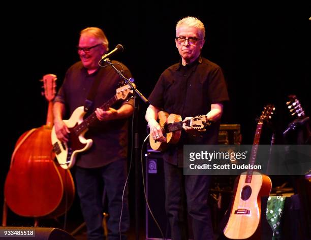 Musicians Conrad Lozano and Louie Perez of the band Los Lobos perform onstage at Thousand Oaks Civic Arts Plaza on March 17, 2018 in Thousand Oaks,...