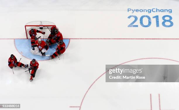 Dominic Larocque , goaltender of Canada and his team mates look dejected after losing the gold medal game against United States in the Ice Hockey...