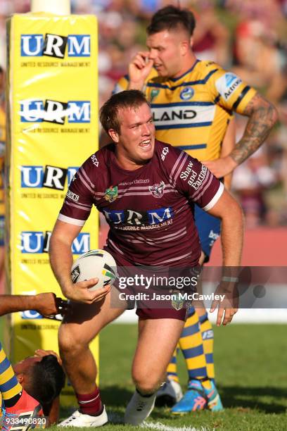 Jake Trbojevic of the Sea Eagles celebrates scoring a try during the round two NRL match between the Manly Sea Eagles and the Parramatta Eels at...