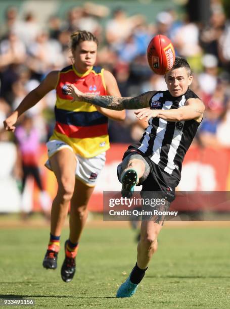 Cecilia McIntosh of the Magpies kicks during the round seven AFLW match between the Collingwood Magpies and the Adelaide Crows at Olympic Park on...