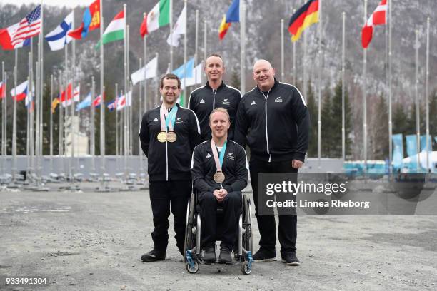 Gold and bronze medalist Adam Hall of New Zealand , Carl Murphy of New Zealand, Ashley Light, Chef de Mission and bronze medalist Corey Peters of New...