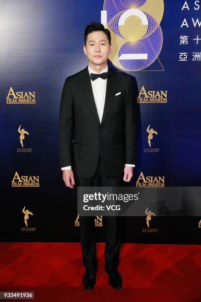 South Korean actor Lee Jung-jin poses on the red carpet of the 12th Asian Film Awards at the Venetian Hotel on March 17, 2018 in Macao, China.