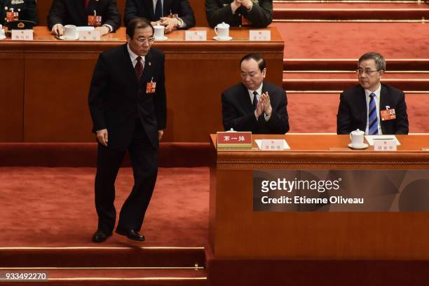 Newly appointed Director of the National Supervisory Commission Yang Xiaodu walks during the sixth plenary session of the National People's Congress...