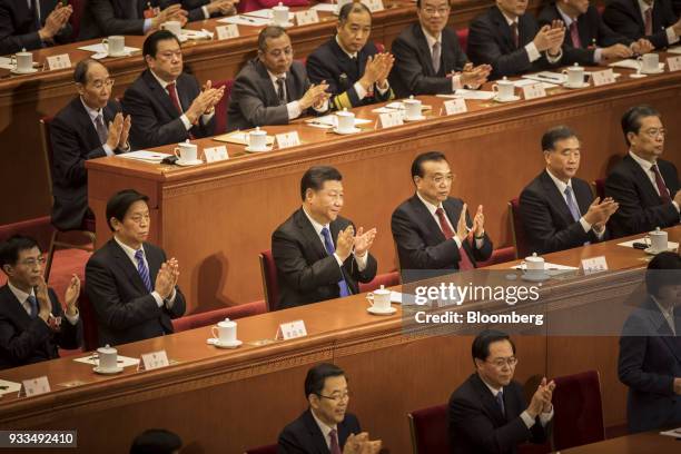 Wang Huning, member of the Communist Party of China's Politburo Standing Committee, second row from left, Li Zhanshu, member of the Communist Party...