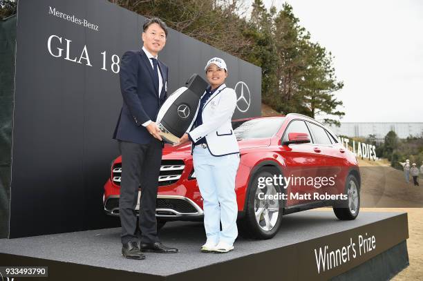 Ai Suzuki of Japan poses for a photographafter winning the T-Point Ladies Golf Tournament at the Ibaraki Kokusai Golf Club on March 18, 2018 in...