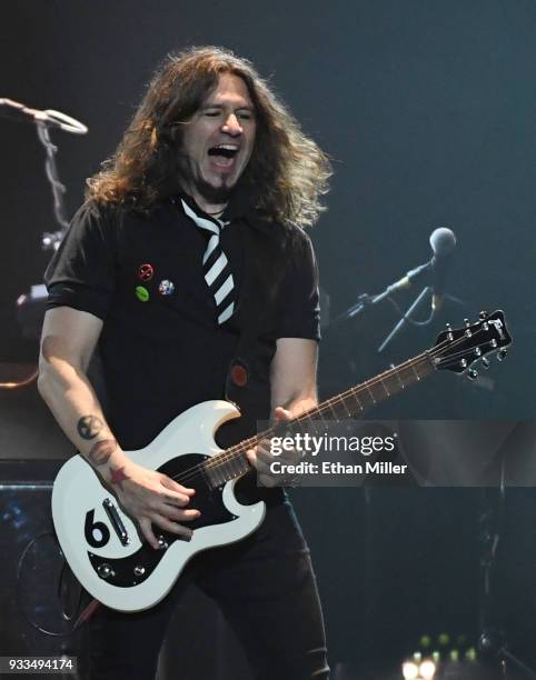 Guitarist Phil X of Bon Jovi performs during a stop of the band's This House is Not for Sale Tour at T-Mobile Arena on March 17, 2018 in Las Vegas,...
