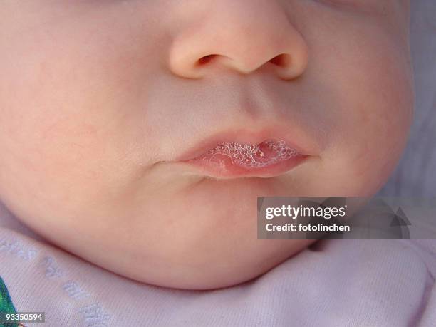 blubber-baby - saliva stock pictures, royalty-free photos & images