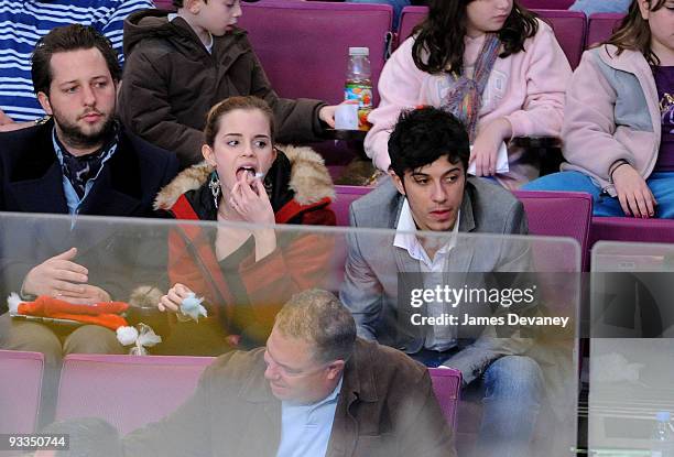 Emma Watson and boyfriend attend the Florida Panthers game against the New York Rangers at Madison Square Garden on November 21, 2009 in New York...