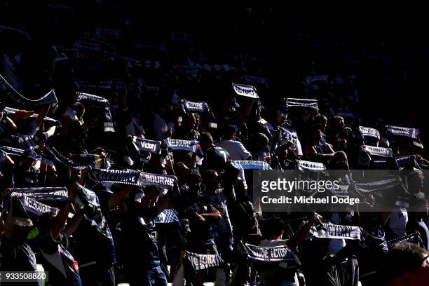 Victory fans show their support during the round 23 A-League match between the Melbourne Victory and the Central Coast Mariners at AAMI Park on March...