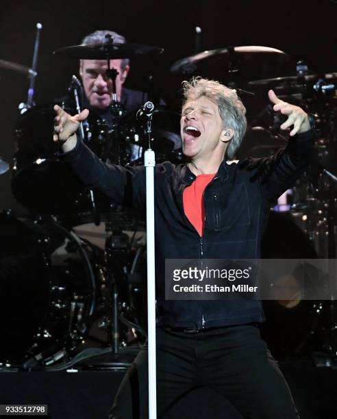 Frontman Jon Bon Jovi of Bon Jovi performs with drummer Tico Torres during a stop of the band's This House is Not for Sale Tour at T-Mobile Arena on...