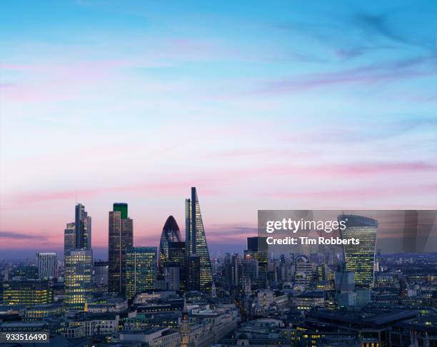 london financial district at night. - london sunrise stock pictures, royalty-free photos & images