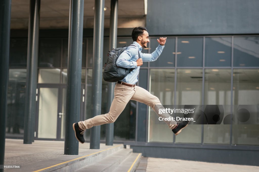 Businessman is running to catch the train