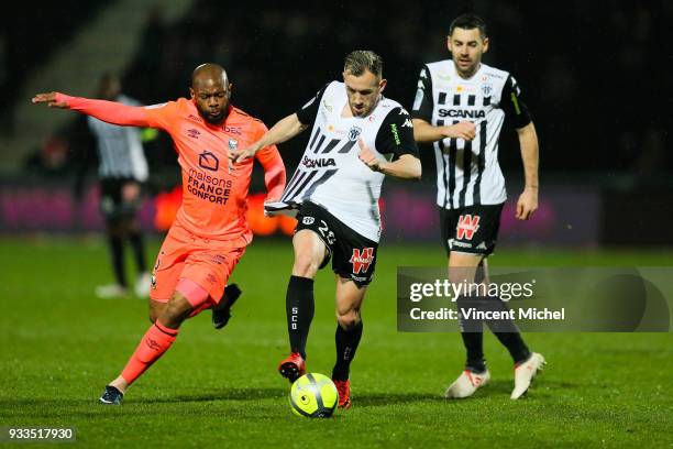Flavien Tait of Angers and Baissama Sankoh of Caen during the Ligue 1 match between Angers SCO and SM Caen at Stade Raymond Kopa on March 17, 2018 in...