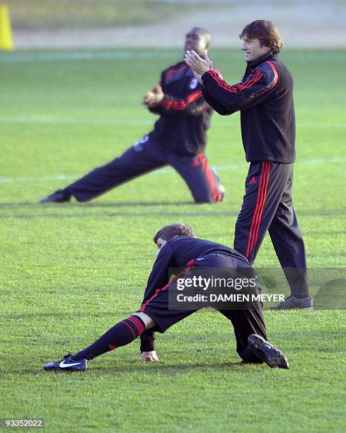 Milan's Brasilian coach Leonardo applauses a player during a training session on the eve of the team UEFA Champions League group stage football match...