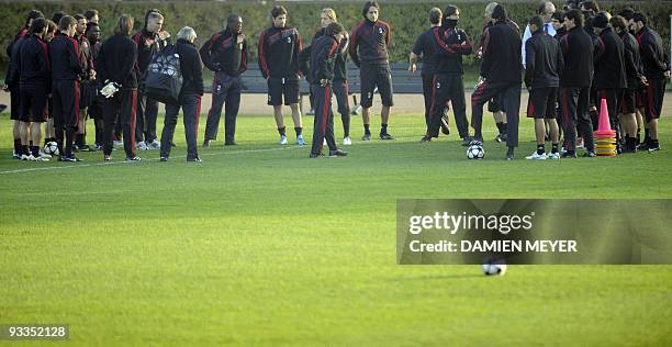 Milan's Brasilian coach Leonardo speaks to his players during a training session on the eve of their UEFA Champions League group stage football match...