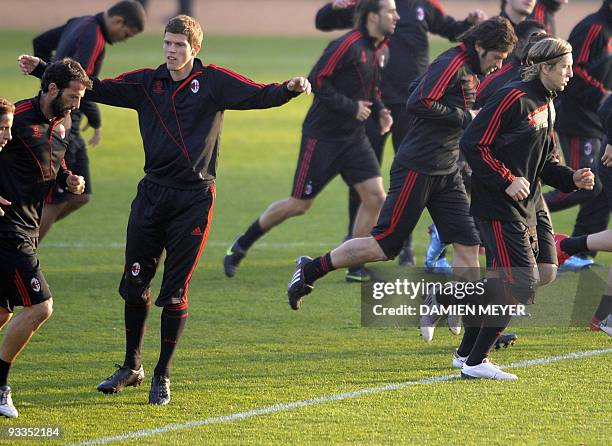 Milan's Dutch forward Klaas-Jan Huntelaar takes part in a training session on the eve of his team's UEFA Champions League group stage football match...