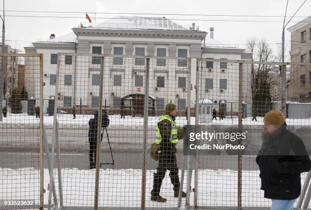 National Guard soldiers stand guard, during a protest of Ukrainian nationalists to who block access for Russian citizens who live in Ukraine to a...