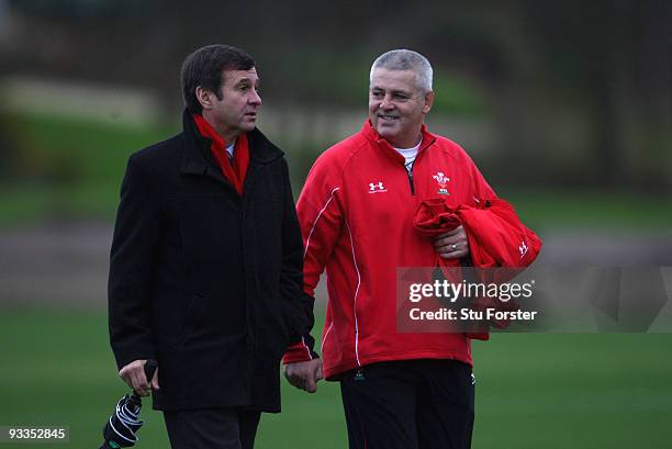 Wales head coach Warren Gatland shares a joke with WRU Chief Executive Roger Lewis during Wales training at the Vale Resort on November 24, 2009 in...