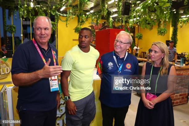 Mark Peters, Jamaican sprinter Yohan Blake, Chairman Peter Beattie and minister Kate Jones speak to media during a visit in the Gold Coast 2018...