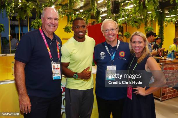 Mark Peters, Jamaican sprinter Yohan Blake, Chairman Peter Beattie and minister Kate Jones speak to media during a visit in the Gold Coast 2018...