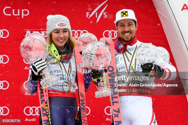 Mikaela Shiffrin of USA wins the globe in the overall standings, Marcel Hirscher of Austria wins the globe in the overall standings during the Audi...