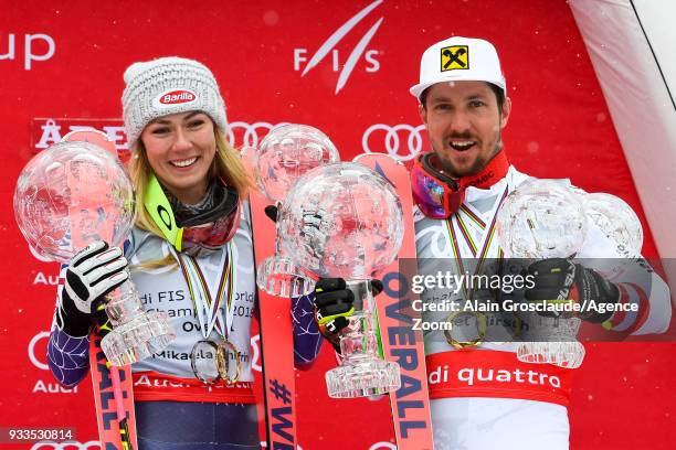 Mikaela Shiffrin of USA wins the globe in the overall standings, Marcel Hirscher of Austria wins the globe in the overall standings during the Audi...