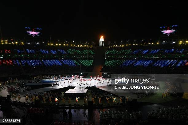 Artists perform during the closing ceremony of the Pyeongchang 2018 Winter Paralympic Games at the Pyeongchang Stadium in Pyeongchang on March 18,...