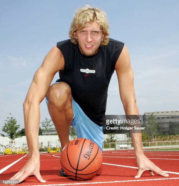 Dirk Nowitzki poses during a photo shooting in his hometown on July 23, 2004 in Wuerzburg, Germany.