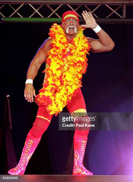 Hulk Hogan enters the stage prior to his bout against Ric Flair during the Hulkamania Tour at the Burswood Dome on November 24, 2009 in Perth,...
