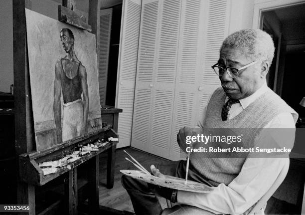 Portrait of African American painter Aaron Douglas , long time professor at Fisk University, and a leading figure in the Harlem Renaissance, painting...