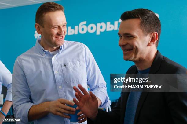 Opposition leaders Alexei Navalny and Ilya Yashin along with Navalny's supporters, election observers monitor the voting at the office of his...