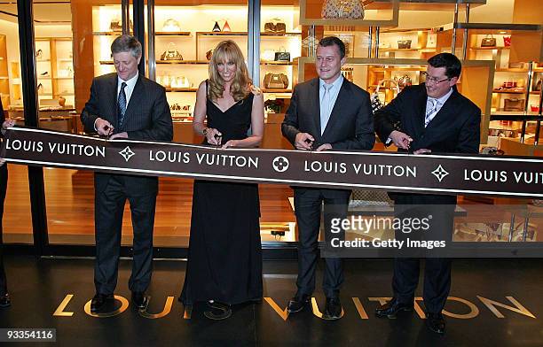 Philip Corne, Toni Collette, Jean-Baptiste Debains and David Marcun during the ribbon cutting ceremony at opening of the new Louis Vuitton store at...